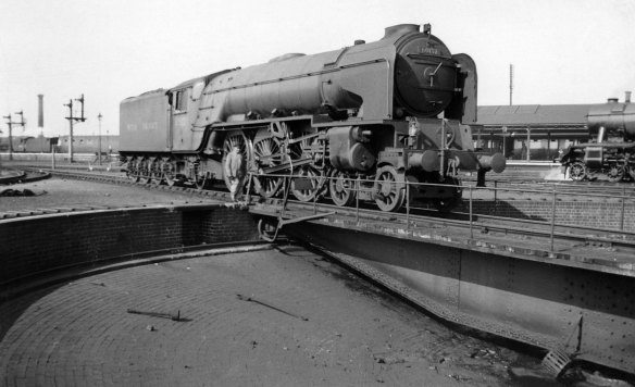 In August 1949 Peter Wilkinson photographed class A1 locomotive No.60132 (later named Marmion), moving onto Grantham shed's turntable. It was based at Gateshead, on Tyneside, and has probably just arrived from the north. It will be turned as the first stage in its preparation for a homeward trip. Photograph lent by Peter Wilkinson.