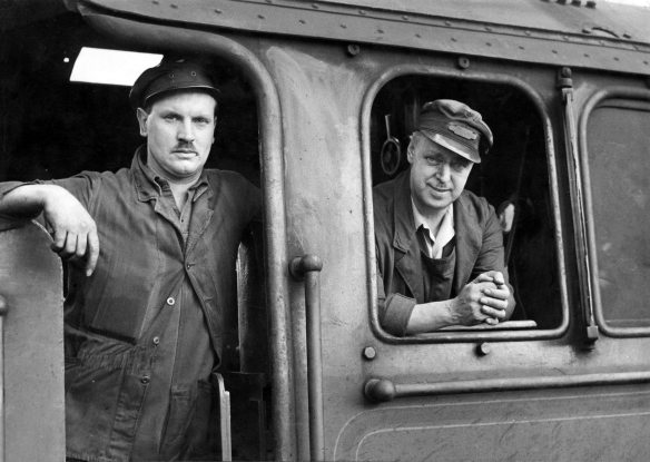 Roy as a fireman with his regular driver, Charlie Hopwood, on 19th June 1959 at Darlington with Class A1 locomotive No. 60142 Edward Fletcher. Photograph taken by Eric Treacy, lent by Roy Veasey.
